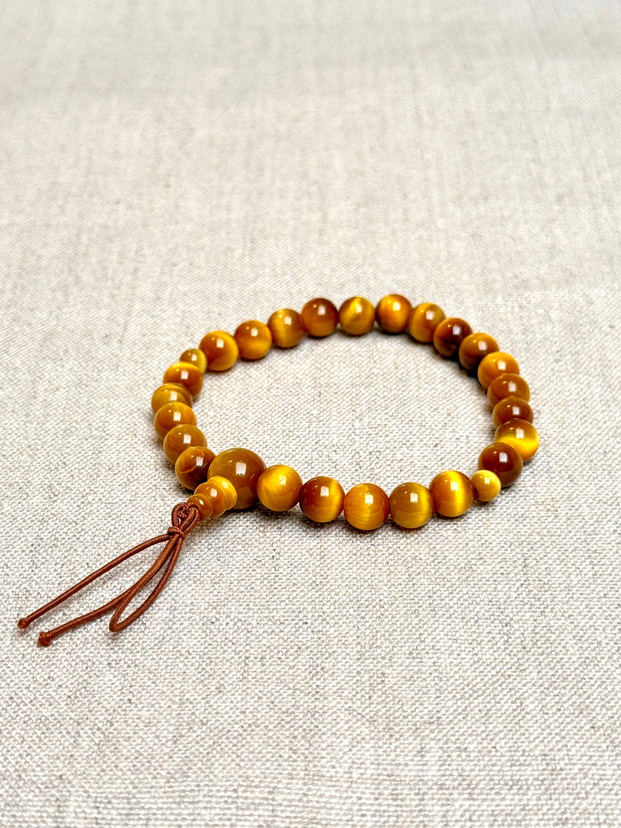 Buddhist-bracelet-white-tiger-eye