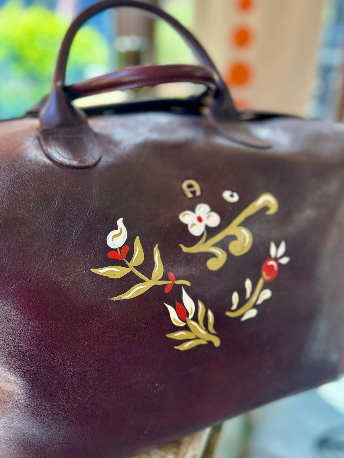 Hand painted leather bag by Marie Clare