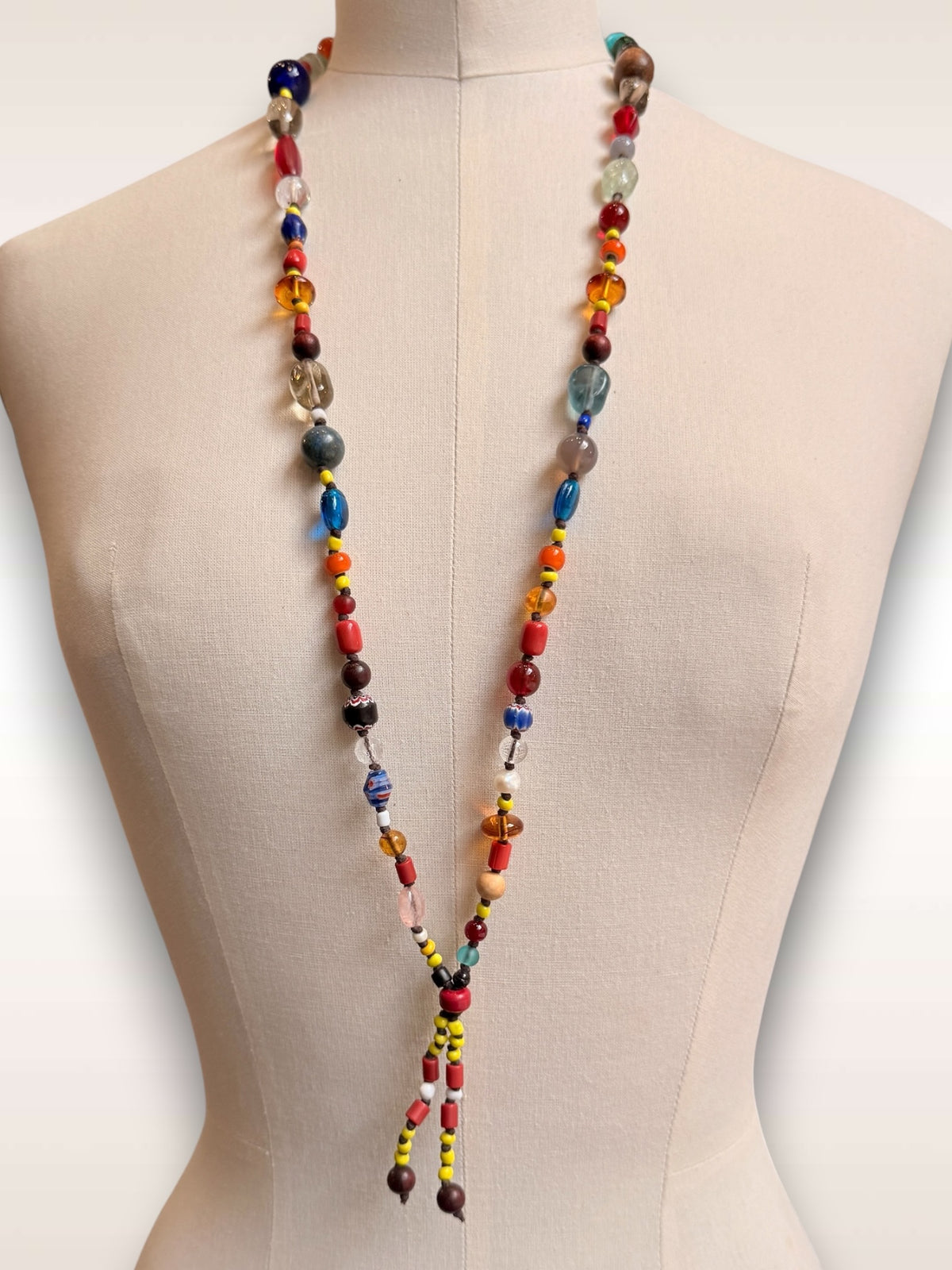Mixed bead necklace w/ yellow & orange tails
